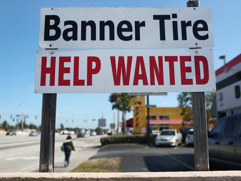 A "Help Wanted" sign is posted in front of a business on Feb. 4 in Miami. Although millions are unemployed, some businesses that require being on-site are struggling to find workers. A "Help Wanted" sign is posted in front of a business on Feb. 4 in Miami. Although millions are unemployed, some businesses that require being on-site are struggling to find workers.