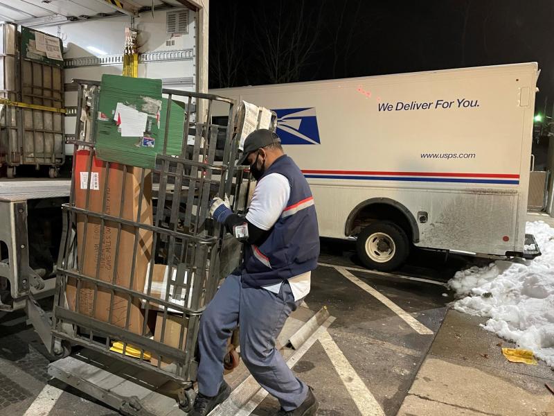 Like many of his colleagues, postal worker Rickey Ramirez is working overtime to keep up with the crush of Christmas deliveries. Many packages are likely to be delivered after Dec. 25. Like many of his colleagues, postal worker Rickey Ramirez is working overtime to keep up with the crush of Christmas deliveries. Many packages are likely to be delivered after Dec. 25.
