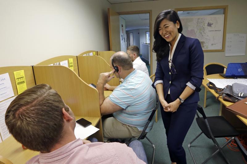 Jinyoung Lee Englund, the Republican candidate for 45th district Senate seat in Washington, talks with volunteers at her campaign headquarters in Woodinville, Wash. The race has attracted national attention and money because Englund's loss would give Demo Jinyoung Lee Englund, the Republican candidate for 45th district Senate seat in Washington, talks with volunteers at her campaign headquarters in Woodinville, Wash. The race has attracted national attention and money because Englund's loss would give Demo