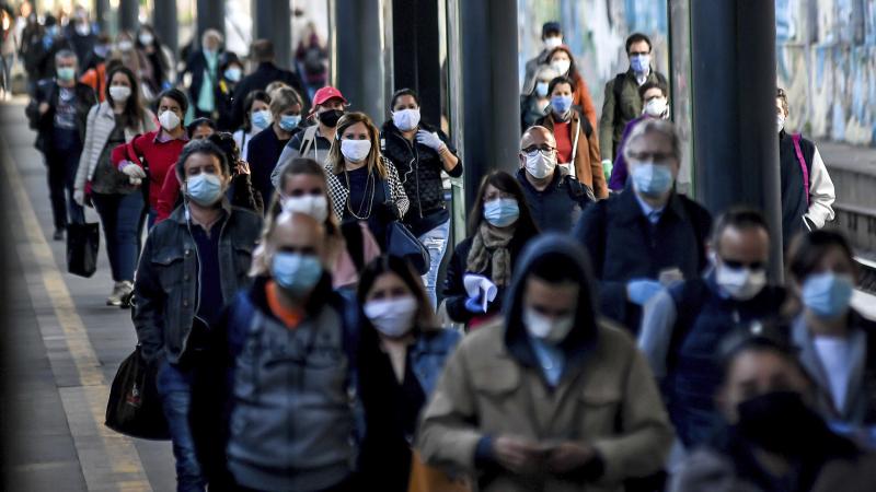Commuters crowd Cadorna train station in Milan on Monday. Italy has begun stirring again, after a nearly two-month coronavirus shutdown, as restrictions on movement ease. Commuters crowd Cadorna train station in Milan on Monday. Italy has begun stirring again, after a nearly two-month coronavirus shutdown, as restrictions on movement ease.