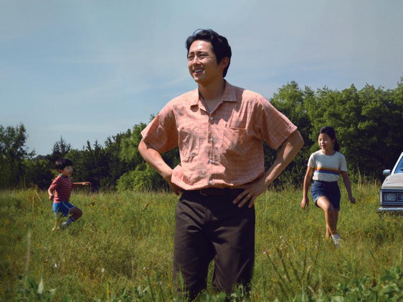 Jacob (Steven Yeun) moves his family from California to farm in rural Arkansas in Minari. Jacob (Steven Yeun) moves his family from California to farm in rural Arkansas in Minari.