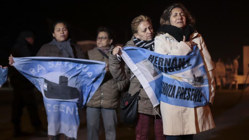 Relatives of crew members on board the ARA San Juan submarine wait outside the navy base in Mar del Plata. Argentina's navy announced early Saturday the missing submarine has been located in a deep ravine in the Atlantic Ocean. Relatives of crew members on board the ARA San Juan submarine wait outside the navy base in Mar del Plata. Argentina's navy announced early Saturday the missing submarine has been located in a deep ravine in the Atlantic Ocean.