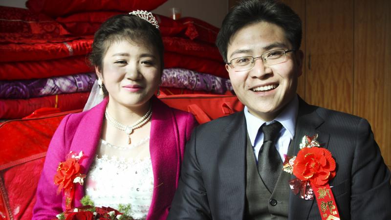 Charles and his bride Xiao Fang met through a social media app where they connected by shaking their smartphones at the same time. NPR's Frank Langfitt met Charles in Shanghai and drove him 500 miles to his family's home in central China for the wedding. Charles and his bride Xiao Fang met through a social media app where they connected by shaking their smartphones at the same time. NPR's Frank Langfitt met Charles in Shanghai and drove him 500 miles to his family's home in central China for the wedding.