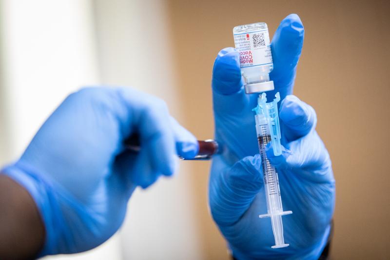 A Moderna COVID-19 vaccine is prepared during a pop-up vaccine clinic at Cristo Rey Church in East Austin on July 24, 2021. A Moderna COVID-19 vaccine is prepared during a pop-up vaccine clinic at Cristo Rey Church in East Austin on July 24, 2021.