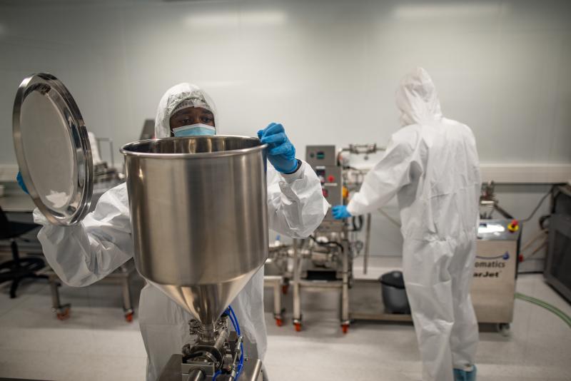 Members of a team at the Afrigen Biologics and Vaccines lab in Cape Town, South Africa. The World Health Organization has enlisted the company to replicate Moderna's COVID-19 vaccine. Members of a team at the Afrigen Biologics and Vaccines lab in Cape Town, South Africa. The World Health Organization has enlisted the company to replicate Moderna's COVID-19 vaccine.
