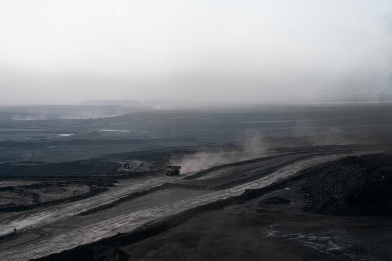 Trucks churn up coal dust at the Tavan Tolgoi coal mine in the South Gobi desert. The Tavan Tolgoi deposit is estimated to possess 6.5 billion tons of coal, including high-grade coking coal — a product vital to the steel-making process. Trucks churn up coal dust at the Tavan Tolgoi coal mine in the South Gobi desert. The Tavan Tolgoi deposit is estimated to possess 6.5 billion tons of coal, including high-grade coking coal — a product vital to the steel-making process.