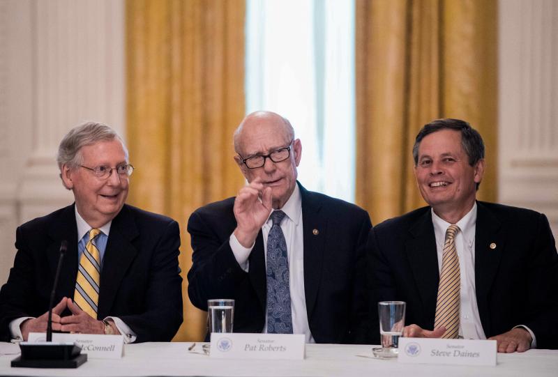 Steve Daines of Montana (right) talks with fellow Republican Sens. Mitch McConnell and Pat Roberts in a White House meeting in June on the GOP health care strategy, which would include deep cuts to Medicaid. Montana insurers say the plan worries them. Steve Daines of Montana (right) talks with fellow Republican Sens. Mitch McConnell and Pat Roberts in a White House meeting in June on the GOP health care strategy, which would include deep cuts to Medicaid. Montana insurers say the plan worries them.