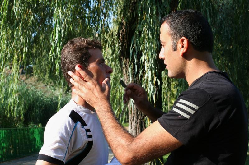 Monzer Omar (right) gives his friend Hatem Alhees a shave after they and hundreds of other Syrian refugees spent the night in a city park in Budapest, Hungary. NPR has followed Omar on his journey from Turkey to central Europe. Monzer Omar (right) gives his friend Hatem Alhees a shave after they and hundreds of other Syrian refugees spent the night in a city park in Budapest, Hungary. NPR has followed Omar on his journey from Turkey to central Europe.