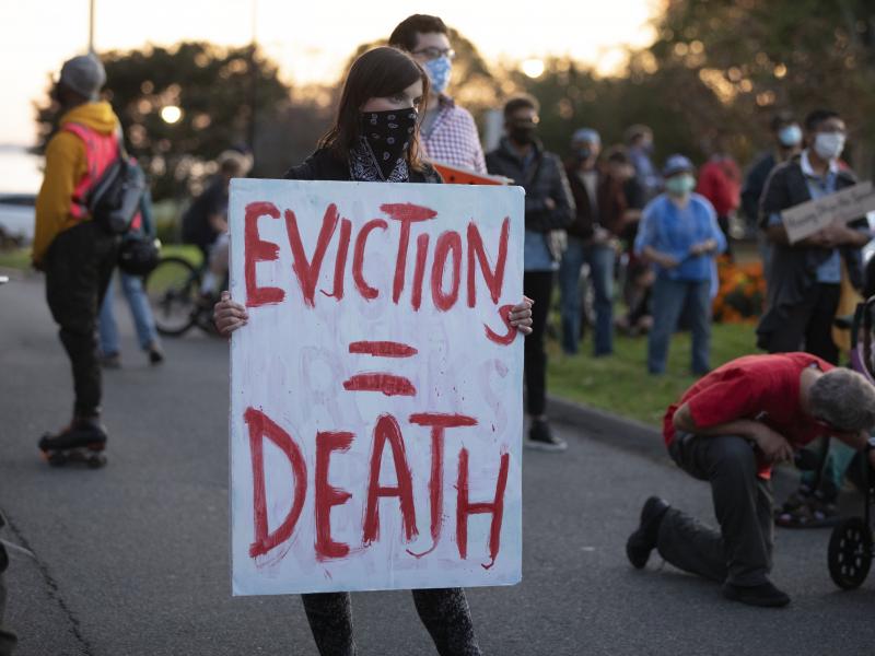 Housing activists gather in Swampscott, Mass., in October to call on the state's governor to support more robust protections against evictions and foreclosures during the pandemic. Housing activists gather in Swampscott, Mass., in October to call on the state's governor to support more robust protections against evictions and foreclosures during the pandemic.