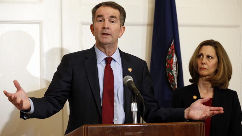 Virginia Gov. Ralph Northam, accompanied by his wife, Pam, speaks during a news conference on Saturday. Northam has resisted widespread calls for his resignation. Virginia Gov. Ralph Northam, accompanied by his wife, Pam, speaks during a news conference on Saturday. Northam has resisted widespread calls for his resignation.