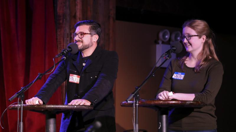 Contestants Paul Alexander and Sarah Sandkuhler face off in a game on Ask Me Another at the Bell House in Brooklyn, New York. Contestants Paul Alexander and Sarah Sandkuhler face off in a game on Ask Me Another at the Bell House in Brooklyn, New York.