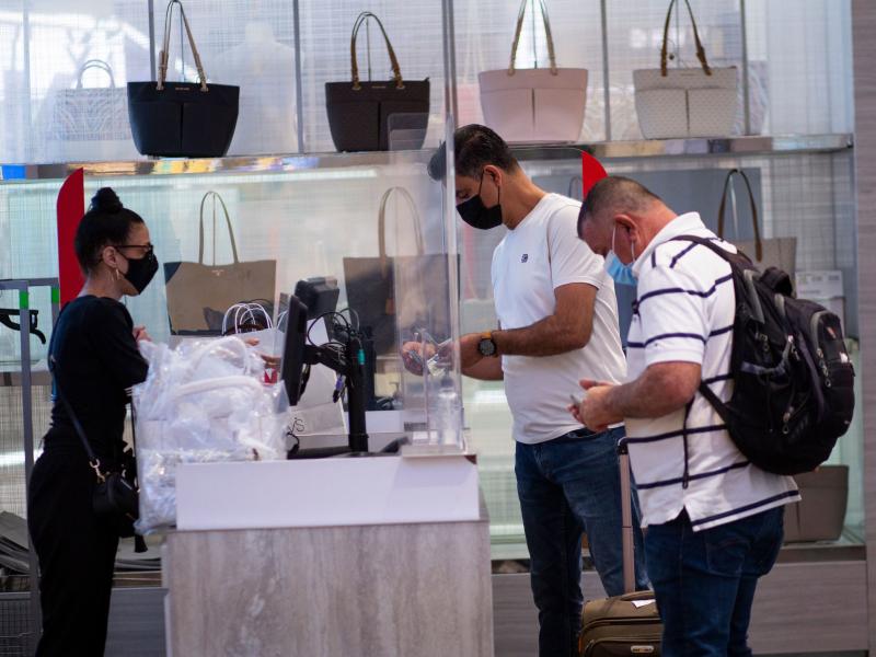 People shop at a Macy's in New York this month. People shop at a Macy's in New York this month.