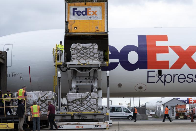 Workers unload a FedEx cargo plane carrying 100,000 pounds of baby formula at Washington Dulles International Airport, in Chantilly, Va., on Wednesday. Workers unload a FedEx cargo plane carrying 100,000 pounds of baby formula at Washington Dulles International Airport, in Chantilly, Va., on Wednesday.