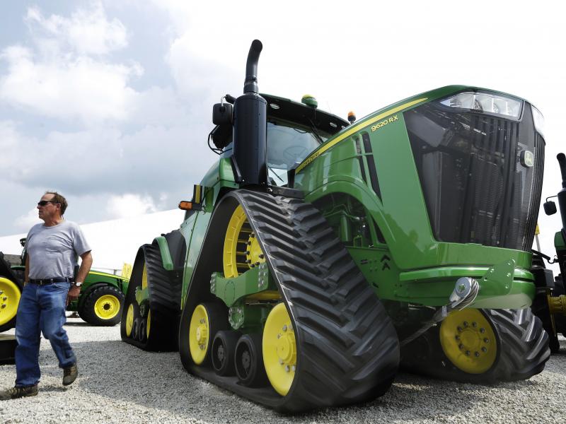 John Deere is known for its signature green and yellow farm equipment, like this equipment on display in 2015 at the Farm Progress Show in Decatur, Ill. John Deere is known for its signature green and yellow farm equipment, like this equipment on display in 2015 at the Farm Progress Show in Decatur, Ill.