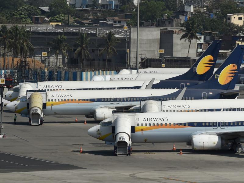 Jet Airways planes are grounded at Chhatrapati Shivaji Maharaj International Airport in Mumbai, India, on Thursday after the airline announced it was shutting down because of financial problems. Jet Airways planes are grounded at Chhatrapati Shivaji Maharaj International Airport in Mumbai, India, on Thursday after the airline announced it was shutting down because of financial problems.
