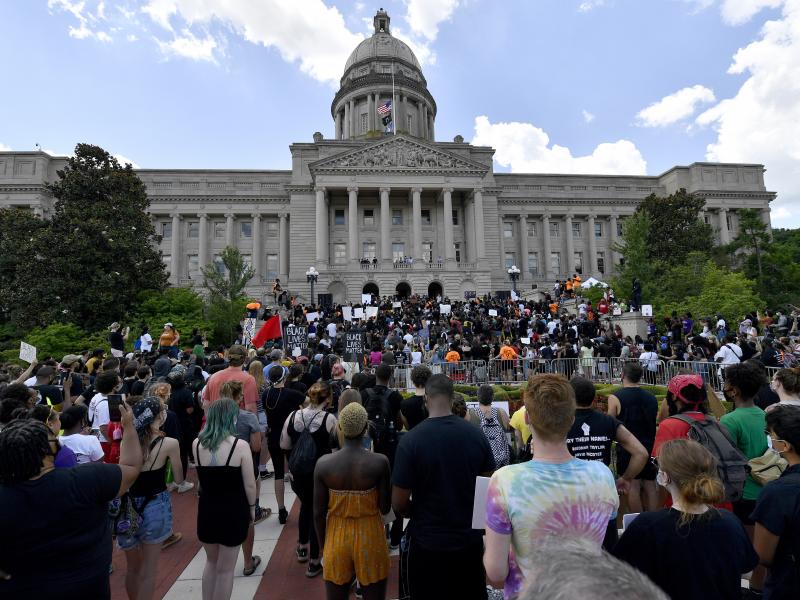 A crowd gathers for a rally to demand justice in the death of Breonna Taylor on the steps of the the Kentucky State Capitol in June. Taylor was killed in her apartment while Louisville police served a warrant. A crowd gathers for a rally to demand justice in the death of Breonna Taylor on the steps of the the Kentucky State Capitol in June. Taylor was killed in her apartment while Louisville police served a warrant.