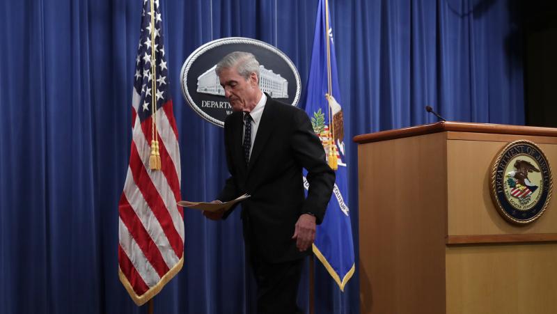 Special counsel Robert Mueller leaves after making a statement about the Russia investigation on Wednesday at the Justice Department. After the investigation, he said, "if we had had confidence that the president clearly did not commit a crime we would ha Special counsel Robert Mueller leaves after making a statement about the Russia investigation on Wednesday at the Justice Department. After the investigation, he said, "if we had had confidence that the president clearly did not commit a crime we would ha