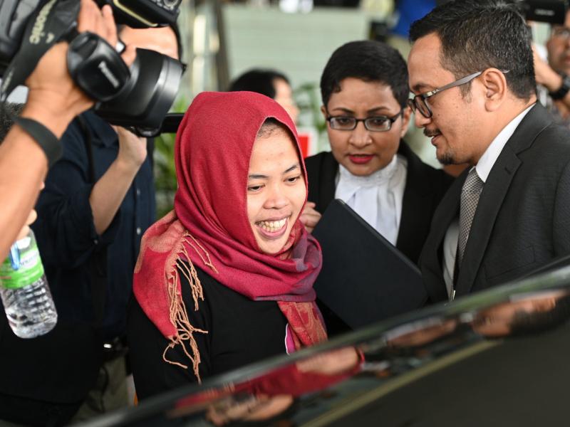 Indonesian national Siti Aisyah smiles while leaving the Shah Alam High Court, outside Kuala Lumpur on March 11. Indonesian national Siti Aisyah smiles while leaving the Shah Alam High Court, outside Kuala Lumpur on March 11.