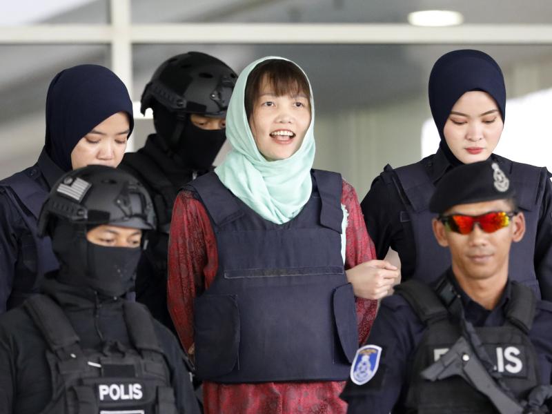 Doan Thi Huong (center) leaves the court in Shah Alam, Malaysia, on Monday. Prosecutors have dropped murder charges against her. Doan Thi Huong (center) leaves the court in Shah Alam, Malaysia, on Monday. Prosecutors have dropped murder charges against her.