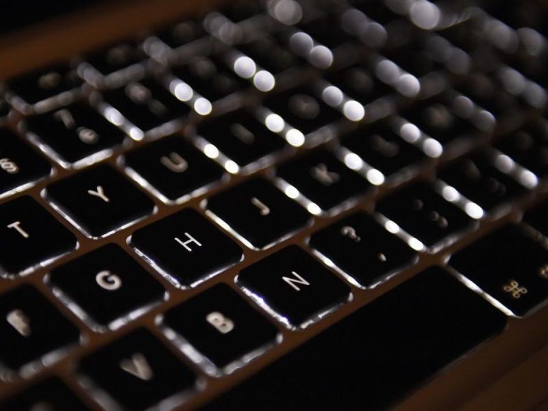 A computer keyboard. A computer keyboard.