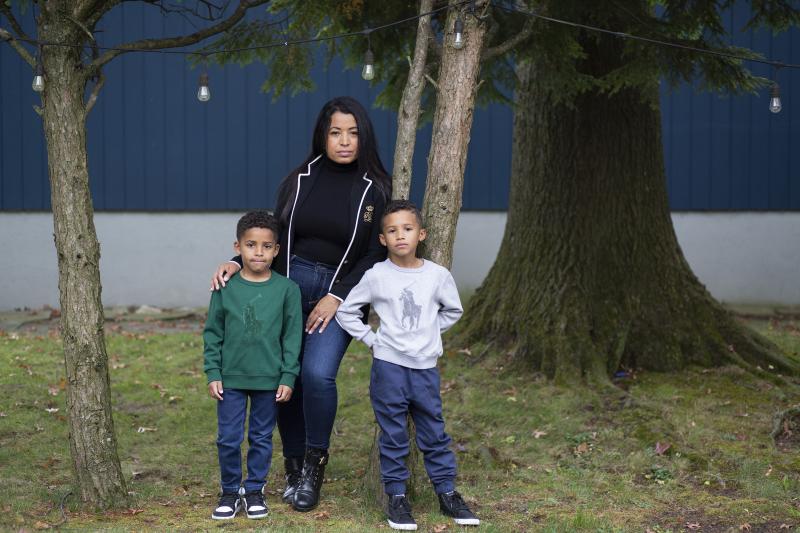 Farida Mercedes and her two sons Sebastian, 5, (left) and Lucas, 7, stand in their backyard in Fairlawn, N.J. Mercedes left her job as an assistant VP of HR at L'Oreal in August after working there for 17 years. As hundreds of thousands of women dropped o Farida Mercedes and her two sons Sebastian, 5, (left) and Lucas, 7, stand in their backyard in Fairlawn, N.J. Mercedes left her job as an assistant VP of HR at L'Oreal in August after working there for 17 years. As hundreds of thousands of women dropped o