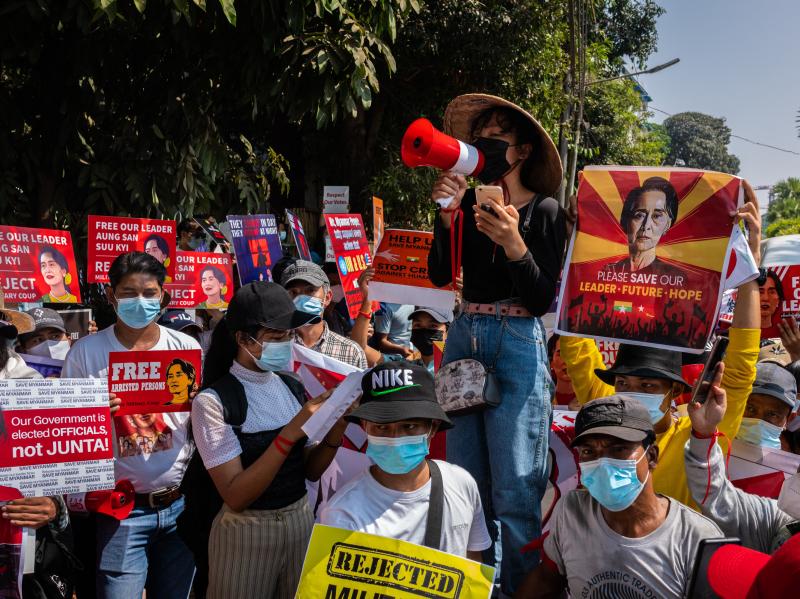 Protesters shout slogans and hold banners in front of the U.N. headquarters on Tuesday in Yangon, Myanmar, calling for the release of ousted leader Aung San Suu Kyi. Protesters shout slogans and hold banners in front of the U.N. headquarters on Tuesday in Yangon, Myanmar, calling for the release of ousted leader Aung San Suu Kyi.
