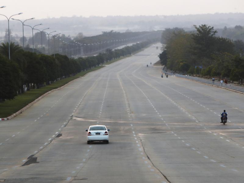 Vehicles make their way on a road in Naypyitaw, Myanmar, Feb. 1. Vehicles make their way on a road in Naypyitaw, Myanmar, Feb. 1.