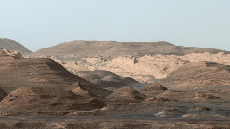 Mars' massive Mount Sharp may have formed billions of years ago as water carried sand and silt into the center of a large crater. Mars' massive Mount Sharp may have formed billions of years ago as water carried sand and silt into the center of a large crater.