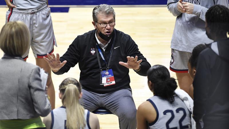 Connecticut head coach Geno Auriemma talks to his team during a game against Villanova in the Big East tournament on March 7, 2021. Auriemma has tested positive for the coronavirus. Connecticut head coach Geno Auriemma talks to his team during a game against Villanova in the Big East tournament on March 7, 2021. Auriemma has tested positive for the coronavirus.