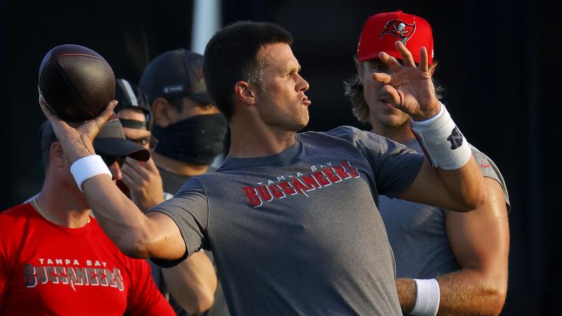 Tom Brady of the Tampa Bay Buccaneers works out in Tampa, Fla., on Tuesday. The NFL is doing daily coronavirus testing for the first two weeks of training. Tom Brady of the Tampa Bay Buccaneers works out in Tampa, Fla., on Tuesday. The NFL is doing daily coronavirus testing for the first two weeks of training.