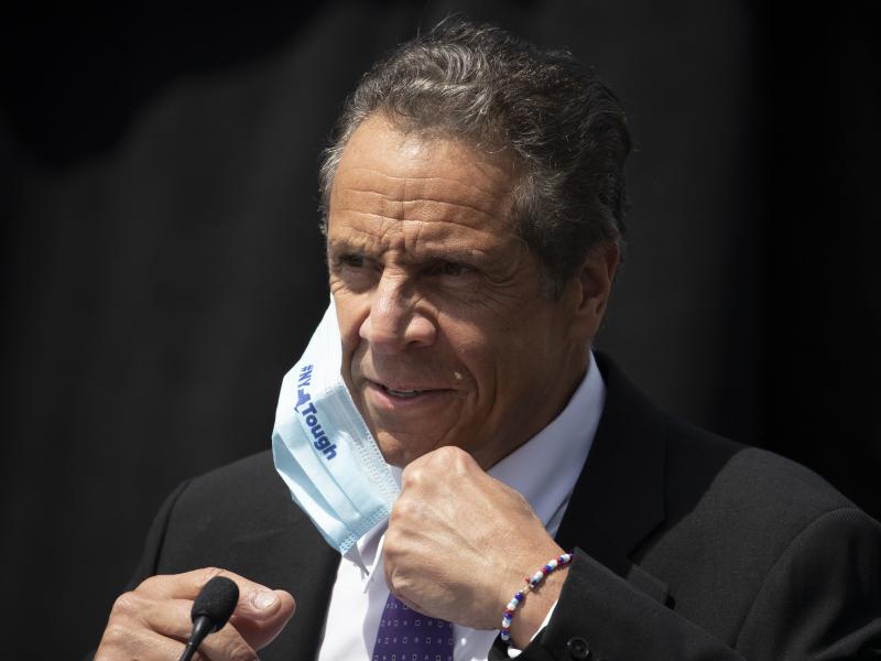 New York Gov. Andrew Cuomo, pictured at a news conference this month, joined Connecticut and New Jersey in advising travelers from 16 states with rising numbers of coronavirus to self-quarantine. New York Gov. Andrew Cuomo, pictured at a news conference this month, joined Connecticut and New Jersey in advising travelers from 16 states with rising numbers of coronavirus to self-quarantine.