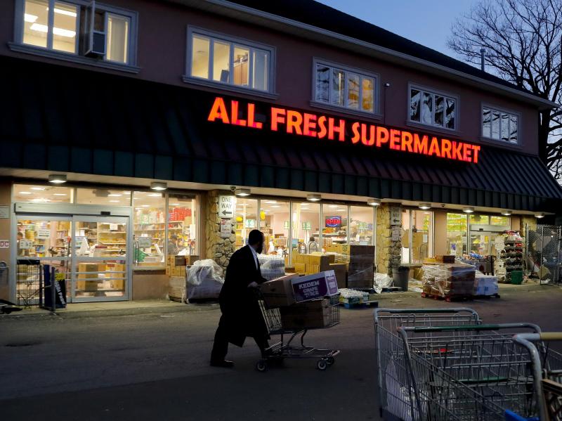 A man walks through the parking lot of a supermarket in New York's Rockland County, which has declared a state of emergency over a measles outbreak. A man walks through the parking lot of a supermarket in New York's Rockland County, which has declared a state of emergency over a measles outbreak.