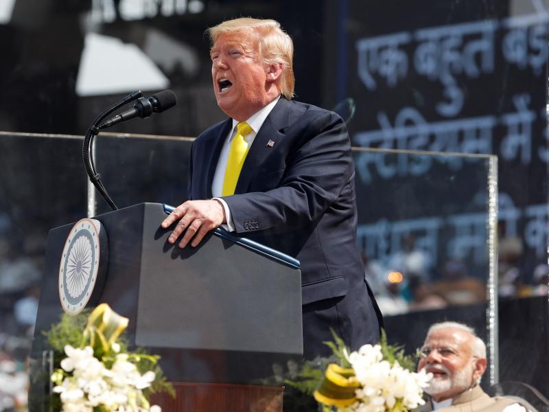 President Trump speaks at the "Namaste Trump" event at Sardar Patel Gujarat Stadium in Ahmedabad, India, on Monday as Indian Prime Minister Narendra Modi looks on. Trump said the two leaders were discussing a possible trade deal and called Modi "a very to President Trump speaks at the "Namaste Trump" event at Sardar Patel Gujarat Stadium in Ahmedabad, India, on Monday as Indian Prime Minister Narendra Modi looks on. Trump said the two leaders were discussing a possible trade deal and called Modi "a very to