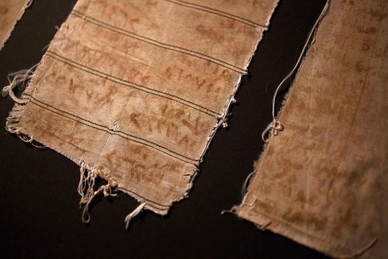 Pieces of cloth that Mansour Omari and other inmates at a notorious Syrian prison used to document the names of the "disappeared" held with them. They made ink out of blood from their bleeding gums and rust from the prison bars. Pieces of cloth that Mansour Omari and other inmates at a notorious Syrian prison used to document the names of the "disappeared" held with them. They made ink out of blood from their bleeding gums and rust from the prison bars.