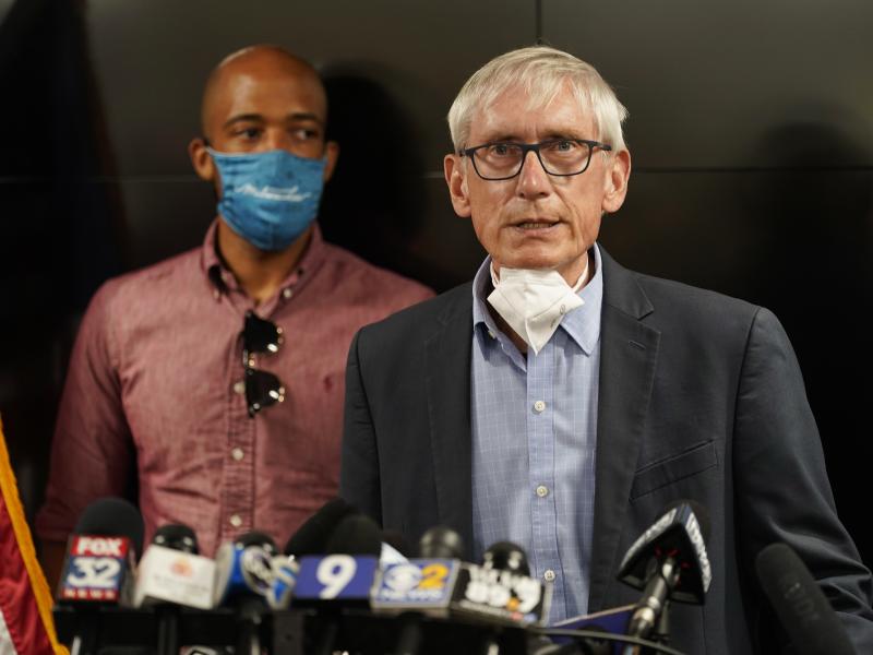 Wisconsin Gov. Tony Evers announced the National Guard will be deployed ahead of a decision whether to charge a police officer who shot Jacob Blake last year. Evers is seen during a press conference in August. Wisconsin Gov. Tony Evers announced the National Guard will be deployed ahead of a decision whether to charge a police officer who shot Jacob Blake last year. Evers is seen during a press conference in August.