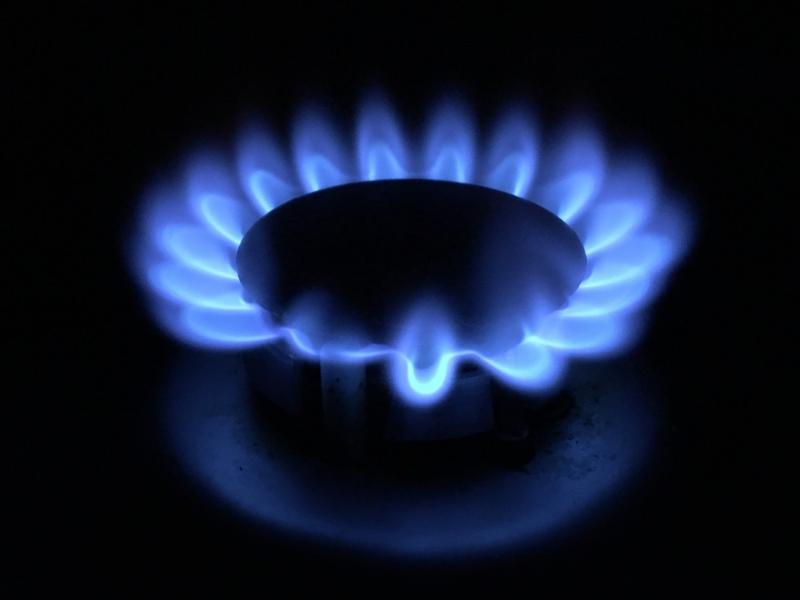 A lower-carbon natural gas flame burns on a stovetop at a NW Natural testing facility. A lower-carbon natural gas flame burns on a stovetop at a NW Natural testing facility.