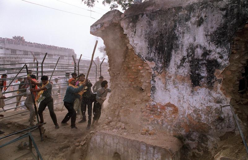 On Dec. 6, 1992, Hindu attackers hit the wall of the 16th century Babri Masjid with iron rods, part of a mob that tore down the mosque. Thousands were killed in rioting that followed the mosque's destruction. On Dec. 6, 1992, Hindu attackers hit the wall of the 16th century Babri Masjid with iron rods, part of a mob that tore down the mosque. Thousands were killed in rioting that followed the mosque's destruction.