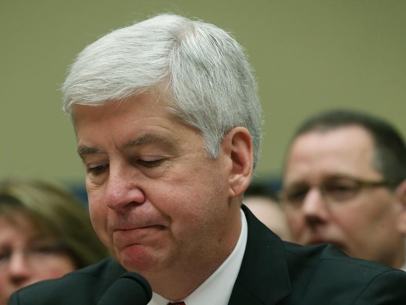 Now Former Michigan Gov. Rick Snyder, (R-MI), listens to Congressional members remarks during a House Oversight and Government Reform Committee hearing, about the Flint, Mich. water crisis in 2016. Now Former Michigan Gov. Rick Snyder, (R-MI), listens to Congressional members remarks during a House Oversight and Government Reform Committee hearing, about the Flint, Mich. water crisis in 2016.