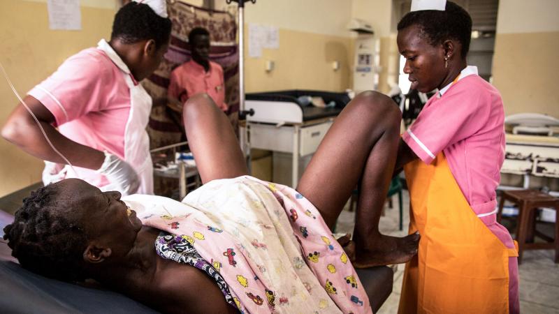 Midwife trainees deliver a baby at the Juba Teaching Hospital in South Sudan. Midwife trainees deliver a baby at the Juba Teaching Hospital in South Sudan.