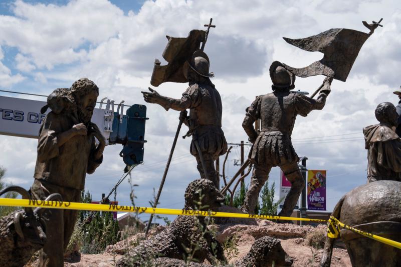 A sculpture of Juan de Oñate's settlers arriving in New Mexico is pictured as city workers remove a sculpture of the Spanish conquistador on June 16 in Albuquerque. A sculpture of Juan de Oñate's settlers arriving in New Mexico is pictured as city workers remove a sculpture of the Spanish conquistador on June 16 in Albuquerque.
