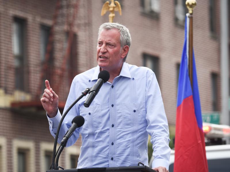 New York City Mayor Bill de Blasio said Monday that city workers will be required to be vaccinated or get tested weekly for COVID-19. De Blasio is seen here in Brooklyn on Sunday at a rally in support of Haiti. New York City Mayor Bill de Blasio said Monday that city workers will be required to be vaccinated or get tested weekly for COVID-19. De Blasio is seen here in Brooklyn on Sunday at a rally in support of Haiti.