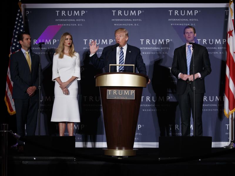 Donald Trump, accompanied by Donald Trump Jr. (from left), Ivanka Trump and Eric Trump at an event in 2016. New York Attorney General Barbara Underwood says the younger Trumps had exercised no real control over the Trump Foundation's activities, despite b Donald Trump, accompanied by Donald Trump Jr. (from left), Ivanka Trump and Eric Trump at an event in 2016. New York Attorney General Barbara Underwood says the younger Trumps had exercised no real control over the Trump Foundation's activities, despite b