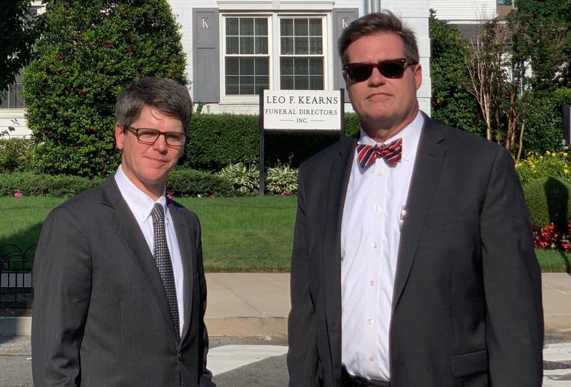 Fourth-generation funeral home director Patrick Kearns (left) and his business partner and brother-in-law Paul Kearns-Stanley stand in front of their funeral home in North Richmond Hill, Queens. Fourth-generation funeral home director Patrick Kearns (left) and his business partner and brother-in-law Paul Kearns-Stanley stand in front of their funeral home in North Richmond Hill, Queens.