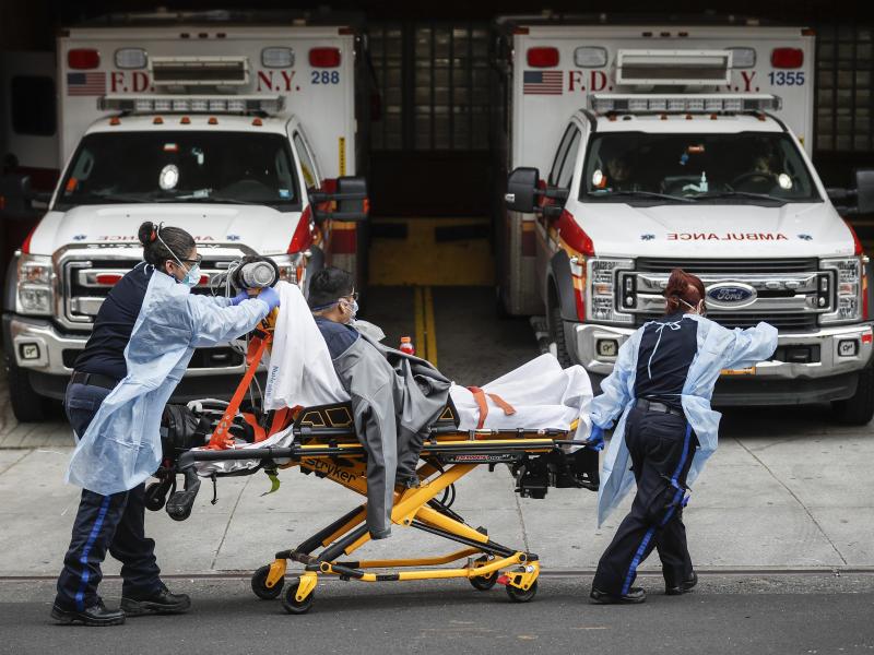 Patients are brought into Wyckoff Heights Medical Center by staff wearing personal protective gear due to COVID-19 concerns on Tuesday in the Brooklyn borough of New York. Patients are brought into Wyckoff Heights Medical Center by staff wearing personal protective gear due to COVID-19 concerns on Tuesday in the Brooklyn borough of New York.