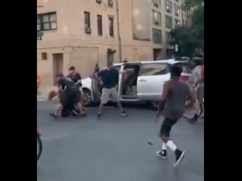A video posted to social media shows police detain a woman during a New York City protest and shove her into an unmarked van. A video posted to social media shows police detain a woman during a New York City protest and shove her into an unmarked van.