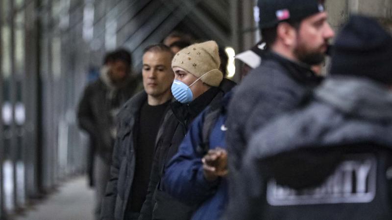 People waiting outside a supermarket comply with citywide social distancing restrictions in New York City earlier this month. People waiting outside a supermarket comply with citywide social distancing restrictions in New York City earlier this month.