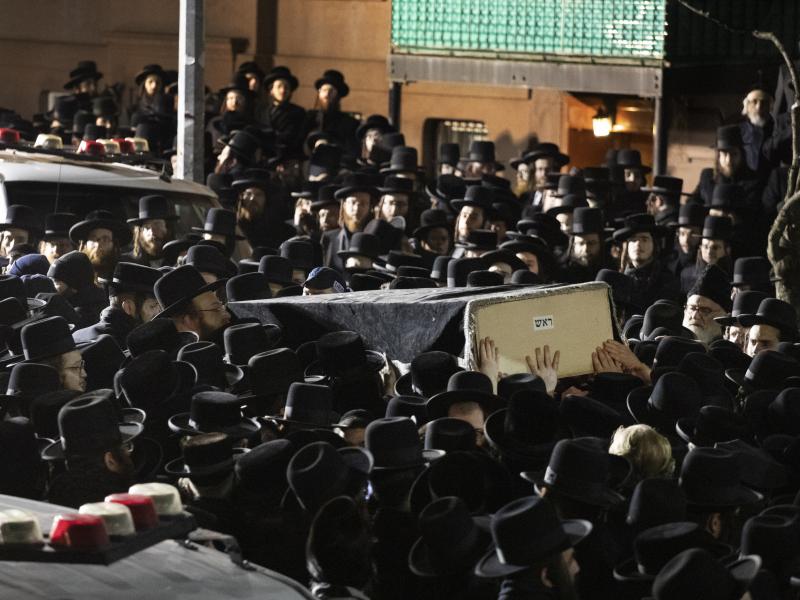 Orthodox Jewish men carry Moshe Deutsch's casket outside a Brooklyn synagogue earlier this month. Deutsch was killed in a shooting inside a Jersey City, N.J., kosher food market. Orthodox Jewish men carry Moshe Deutsch's casket outside a Brooklyn synagogue earlier this month. Deutsch was killed in a shooting inside a Jersey City, N.J., kosher food market.