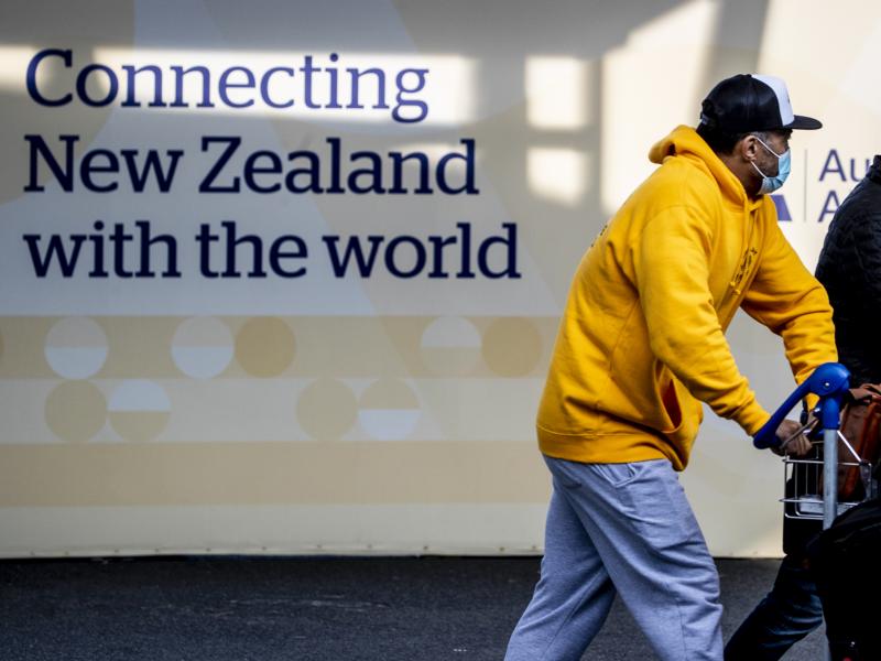 Passengers arrive at Auckland's International Airport, in Auckland, New Zealand, on Wednesday. Passengers arrive at Auckland's International Airport, in Auckland, New Zealand, on Wednesday.