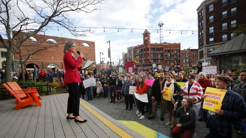 Alison Beyea of ACLU of Maine speaks during an abortion-rights rally at Congress Square Park in Portland, Maine, in May. Democrats elected last November have pushed through two laws that expand access to abortion in the state. Alison Beyea of ACLU of Maine speaks during an abortion-rights rally at Congress Square Park in Portland, Maine, in May. Democrats elected last November have pushed through two laws that expand access to abortion in the state.