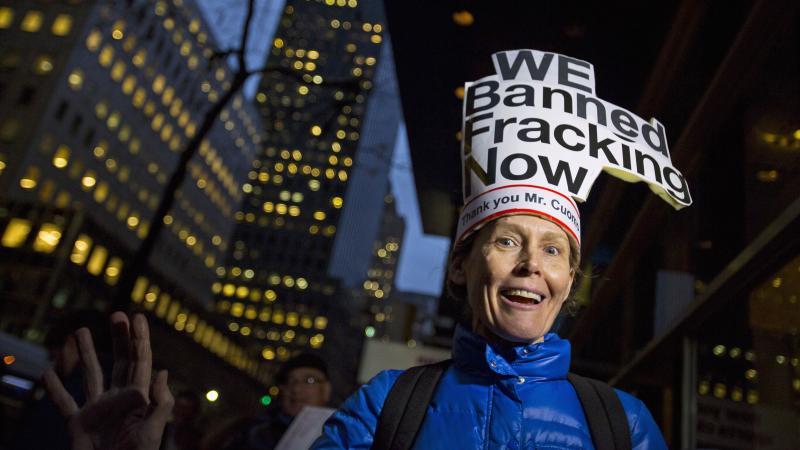 Leslie Roeder of New York City cheers outside New York Gov. Andrew Cuomo's office on Wednesday after the state announced a ban on hydraulic fracturing. Leslie Roeder of New York City cheers outside New York Gov. Andrew Cuomo's office on Wednesday after the state announced a ban on hydraulic fracturing.